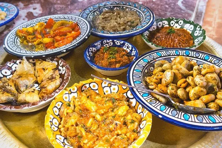 Moroccan cooked salads served in painted Fes pottery
